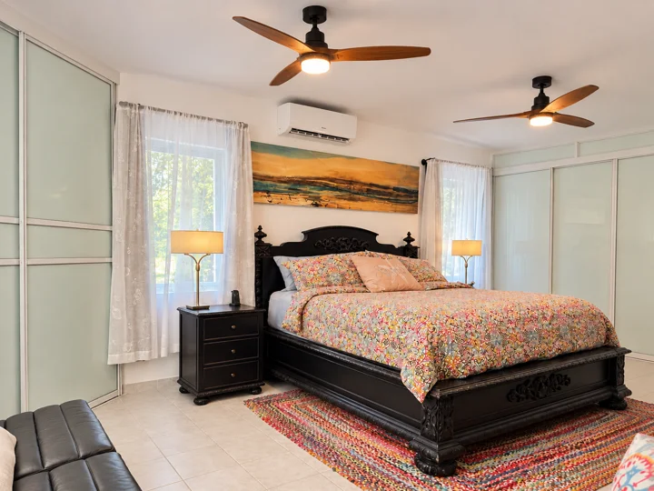Bedroom — dark wood bed