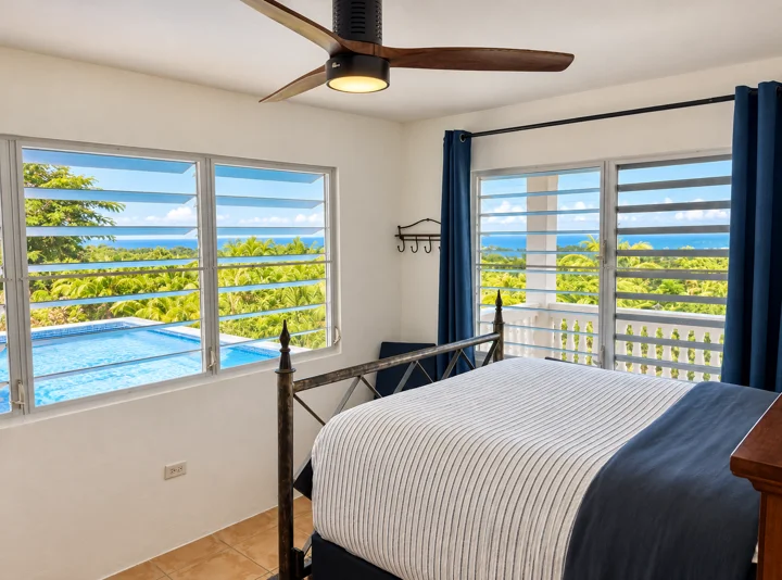 Bedroom — ocean-facing windows
