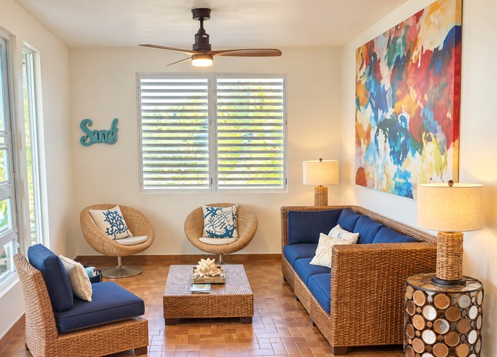 Upstairs blue wicker living room